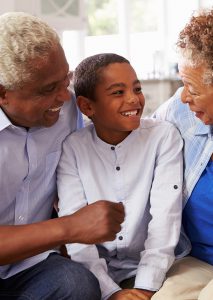 Grandparents with Grandchild - Retirement Planning Services